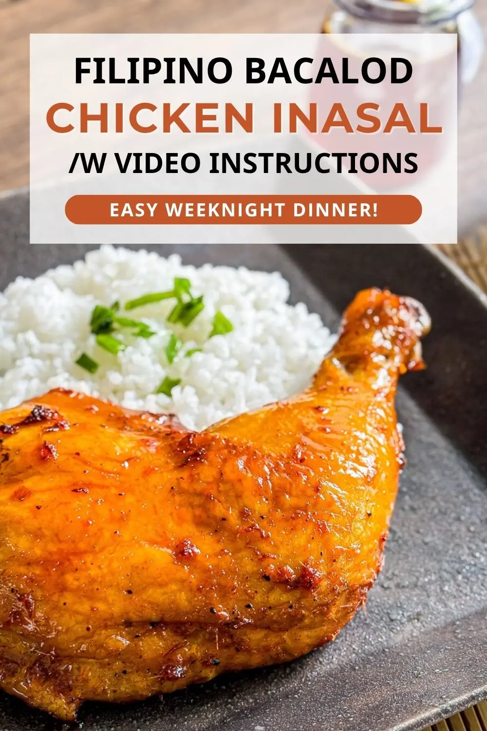 Filipino chicken inasal with jasmine rice on a black dish.