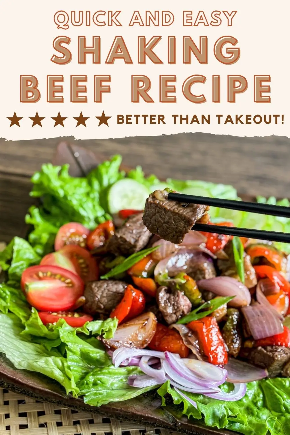 Vietnamese shaking beef with tomatoes, shallots, and chilies, served over a bed of lettuce.