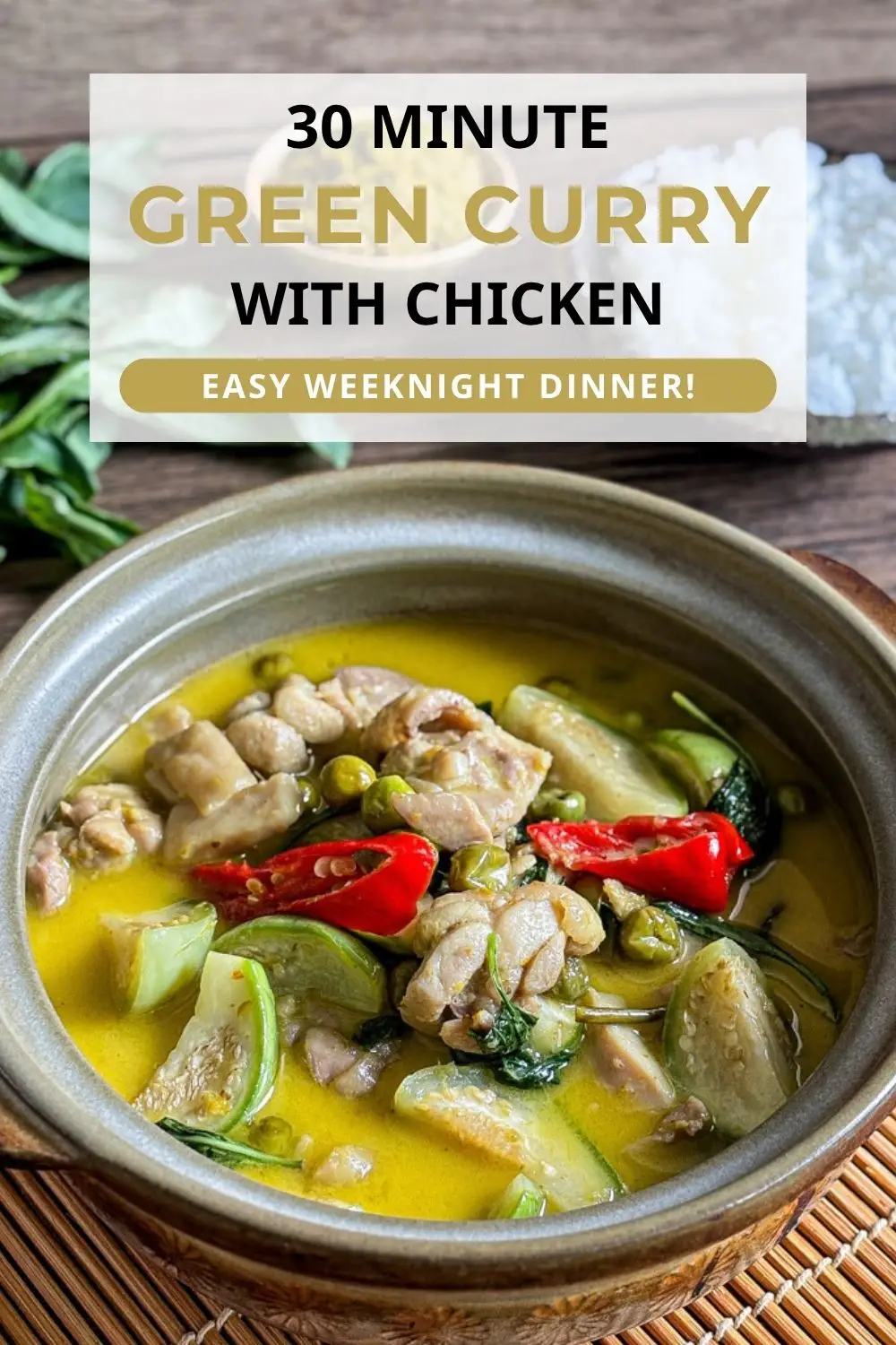 Thai green curry with chicken and vegetables served in a traditional bowl.