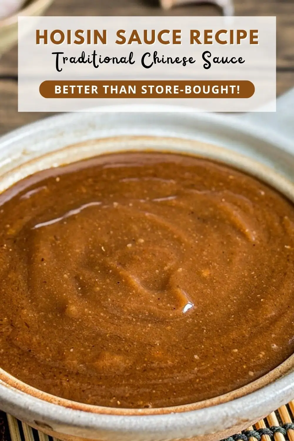 Homemade hoisin sauce in a ceramic bowl, thick and glossy with a rich brown color.