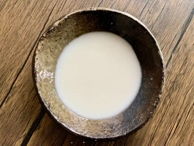Cornstarch mixed with water in a small bowl.